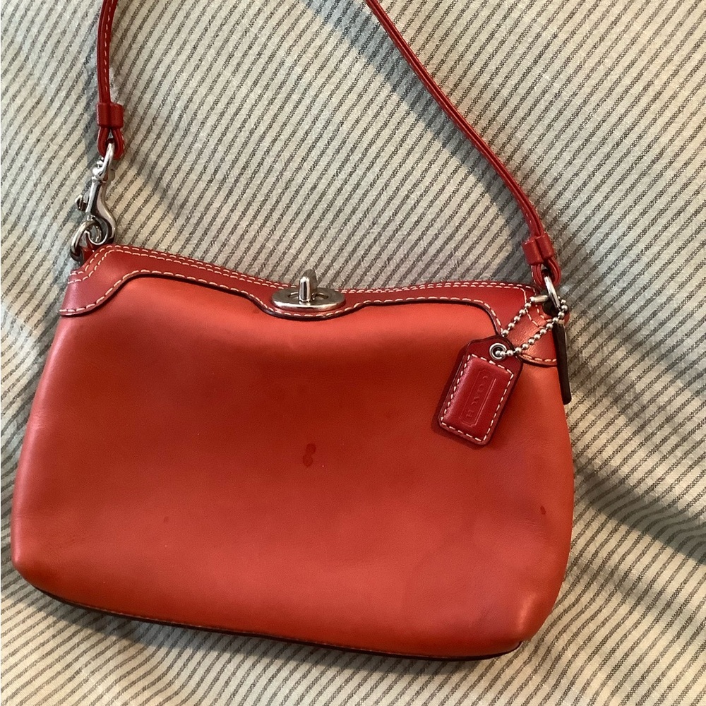 Coach Vibrant Burnt Orange Leather Wristlet